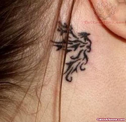 Little Phoenix Tattoo Behind Ear