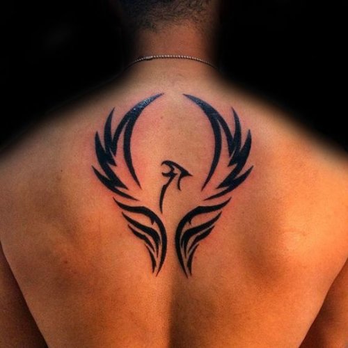 Amazing Tribal Phoenix Tattoo On Upper Back