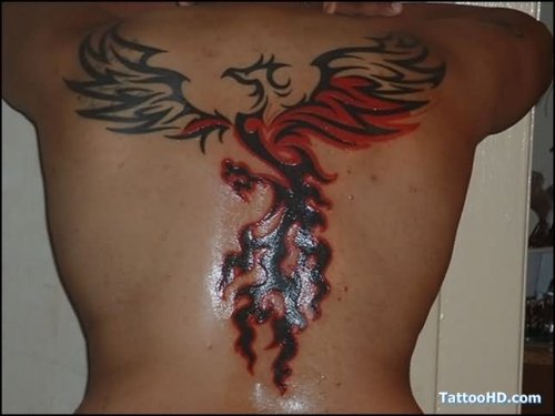 Amazing Flying Tribal Phoenix Tattoo