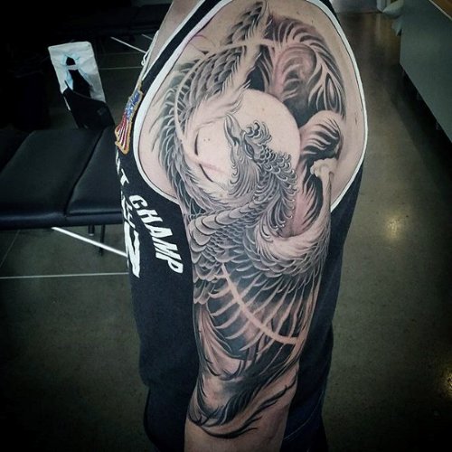 Grey And Black Phoenix Tattoo On Half Sleeve