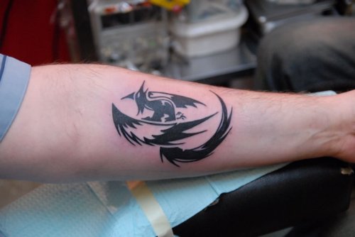 Black Phoenix Tattoo On Left Forearm