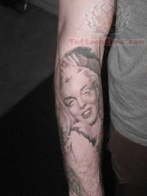 Pin Up Tattoo On Arm For Men