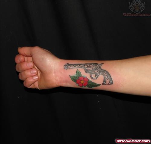 Pistol Tattoo On Wrist