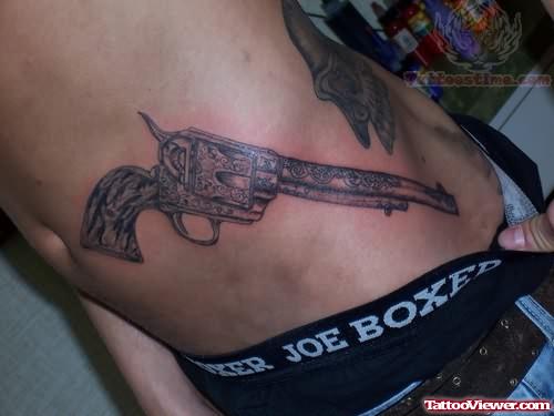 Pistol Tattoo For Ribs