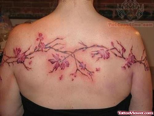 Vine Plant Tattoo On Girl Back