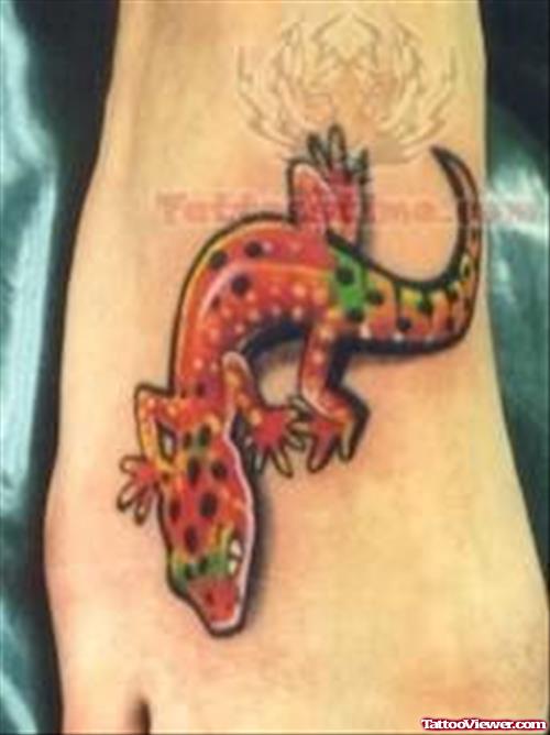 Red Reptile Tattoo On Foot