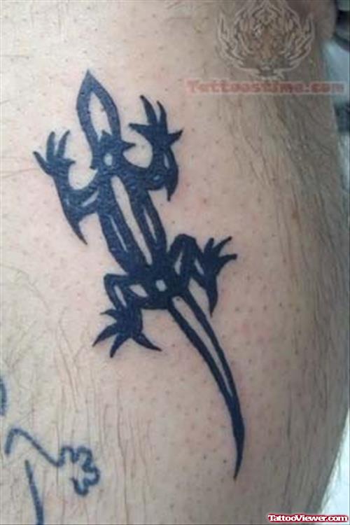 Lizard Shaped Black Tattoo