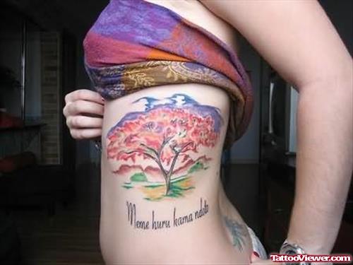 Coloured Tree Tattoo On Rib