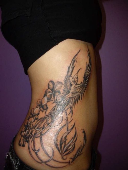 Phoenix Bird Rib Tattoo