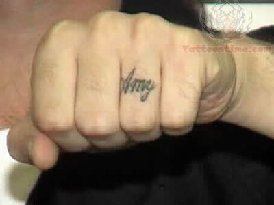 Amy Ring Tattoo On Finger