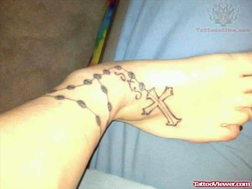 Rosary Beads Tattoo On Foot