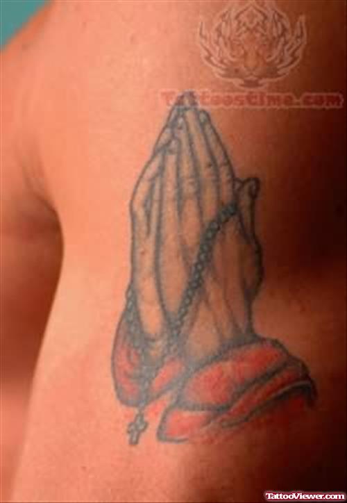 Folding Hands And Rosary Bead Tattoo