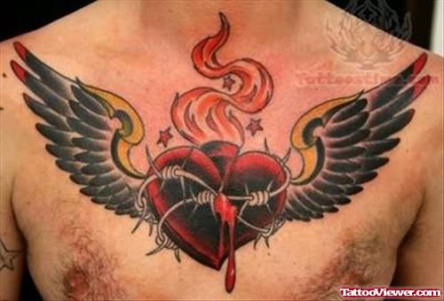 Sacred Heart Winged Tattoo On Chest