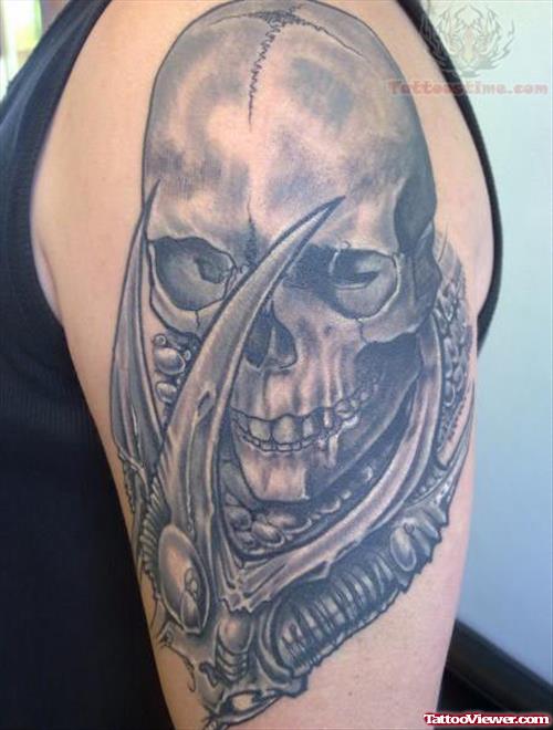 Scary Skull Tattoo On Biceps