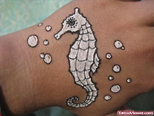 Seahorsw Whitw Ink Tattoo On Hand