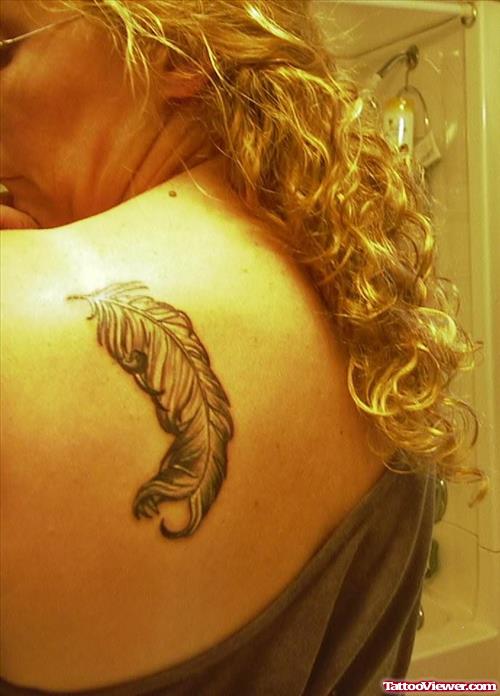 Feather SeaHorse Tattoo On Back