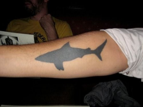 Blackish Shark Tattoo On Arm