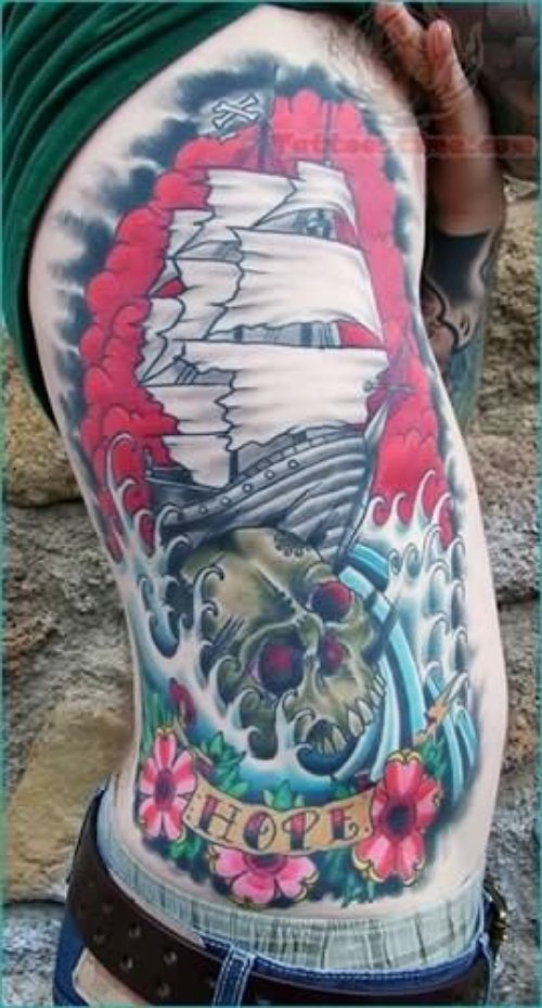 Skull And Ship Tattoo On Rib