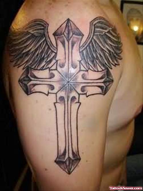 Cross And Wings Tattoo On Shoulder