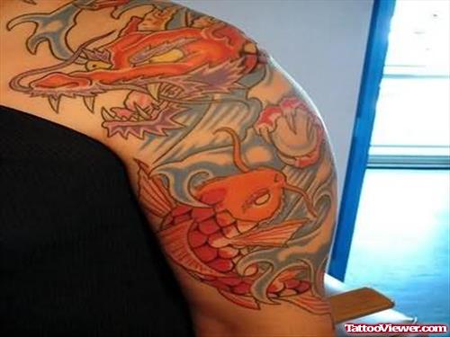 Koi Fish Coloured Tattoo On Shoulder