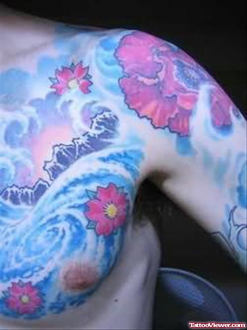 Anemone Tattoo On Chest & Shoulder