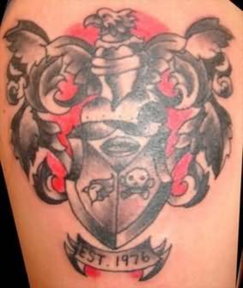 Coloured Family Crest Tattoo On Shoulder