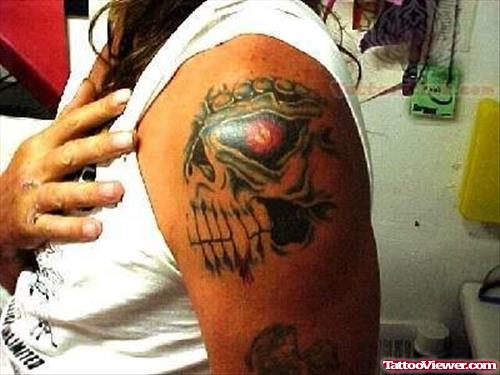 Skull Tattoo On Left Biceps