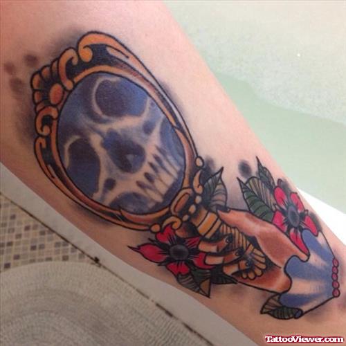 skull in mirror tattoo