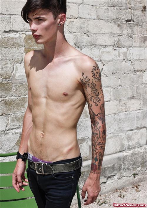 Man With Left Sleeve Tattoo