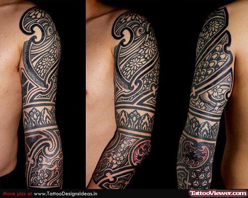 Grey Ink Tribal Left Sleeve Tattoo