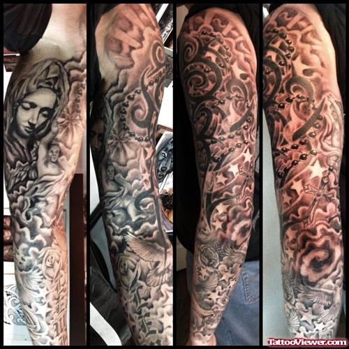 Grey Ink Tribal And Religious Sleeve Tattoo