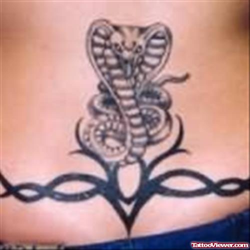 Snake And Tribal Design Tattoo
