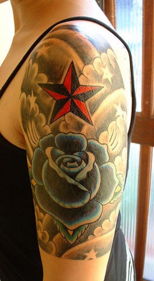 Red Nautical Star And Rose Flower Half Sleeve Tattoo