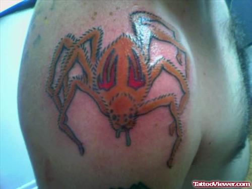 Red Eye Spider Tattoo On Shoulder