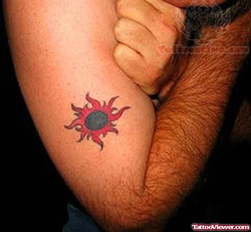 Sun Tattoo On Muscle