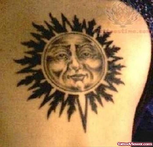 Elegant Sun Tattoo On Back Shoulder