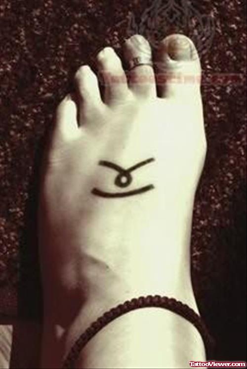 Symbol Tattoo On Foot