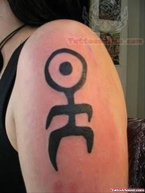 Unique Symbol Tattoo On Bicep
