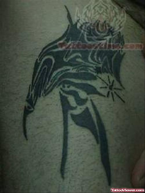 Blackish Symbol Tattoo