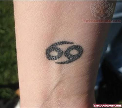Beautiful Cancer Symbol Tattoo on Wrist