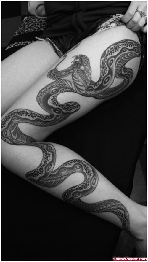 Large Snake Tattoo On Thigh and Left Leg