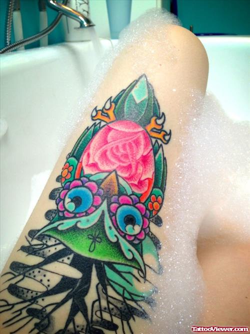 Floral Colored Owl Tattoo On Thigh