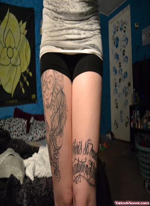 Feather And Quote Thigh Tattoos