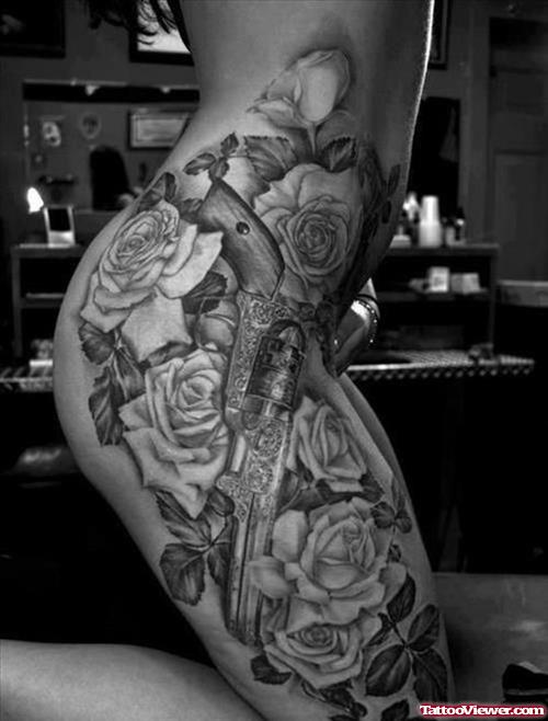 Rose Flowers And Pistol Right Thigh Tattoo
