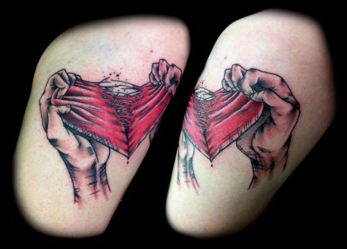 Ripping Heart Tattoo On Thigh