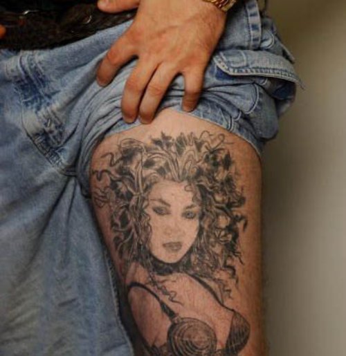 Girl Thigh Tattoo