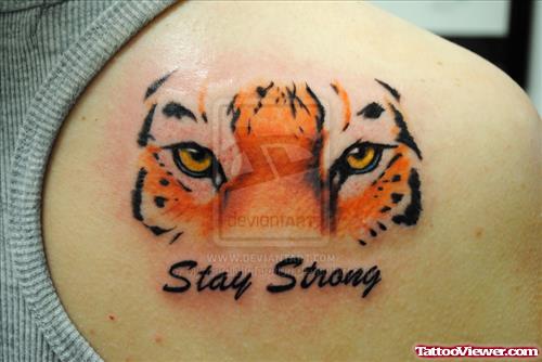 Color Ink Tiger Eyes Tattoo On Back Shoulder
