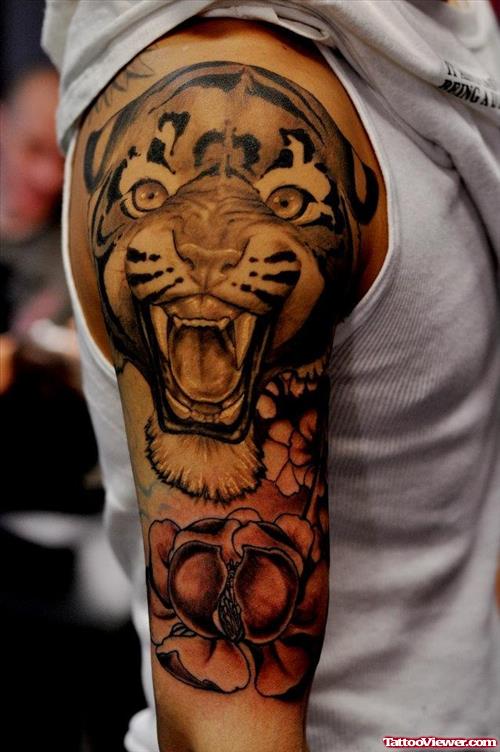Amazing Grey Ink Tiger Head Tattoo On Half Sleeve