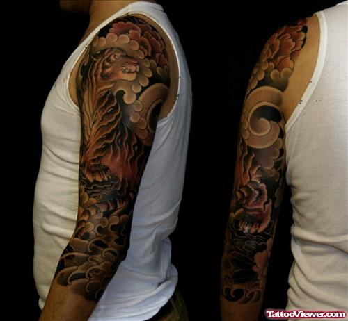 Dark Ink Tiger Tattoo On Left Sleeve