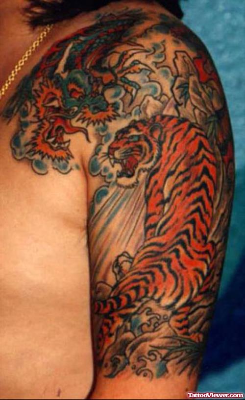 Colored Chinese Tiger Tattoo On Left Half Sleeve